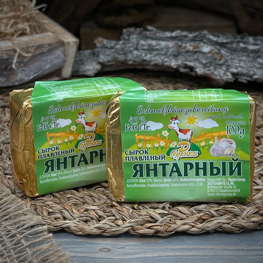 Янтарный сыр плавленый с чесноком "Буренка" — фото 3