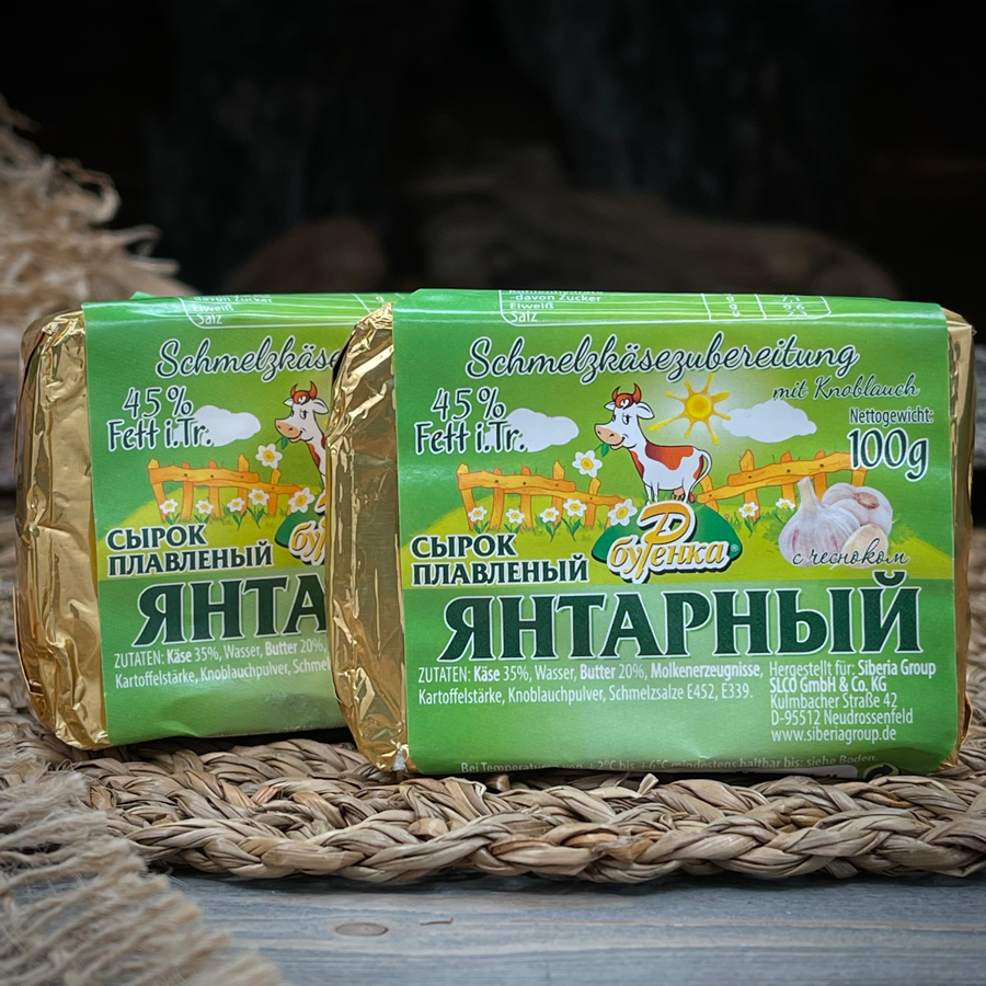 Янтарный сыр плавленый с чесноком "Буренка" — фото 4